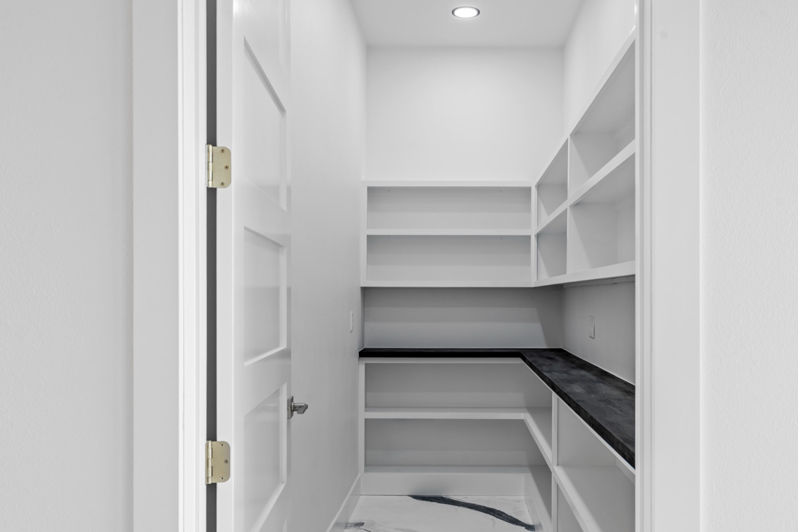 Walk-in pantry with custom shelving